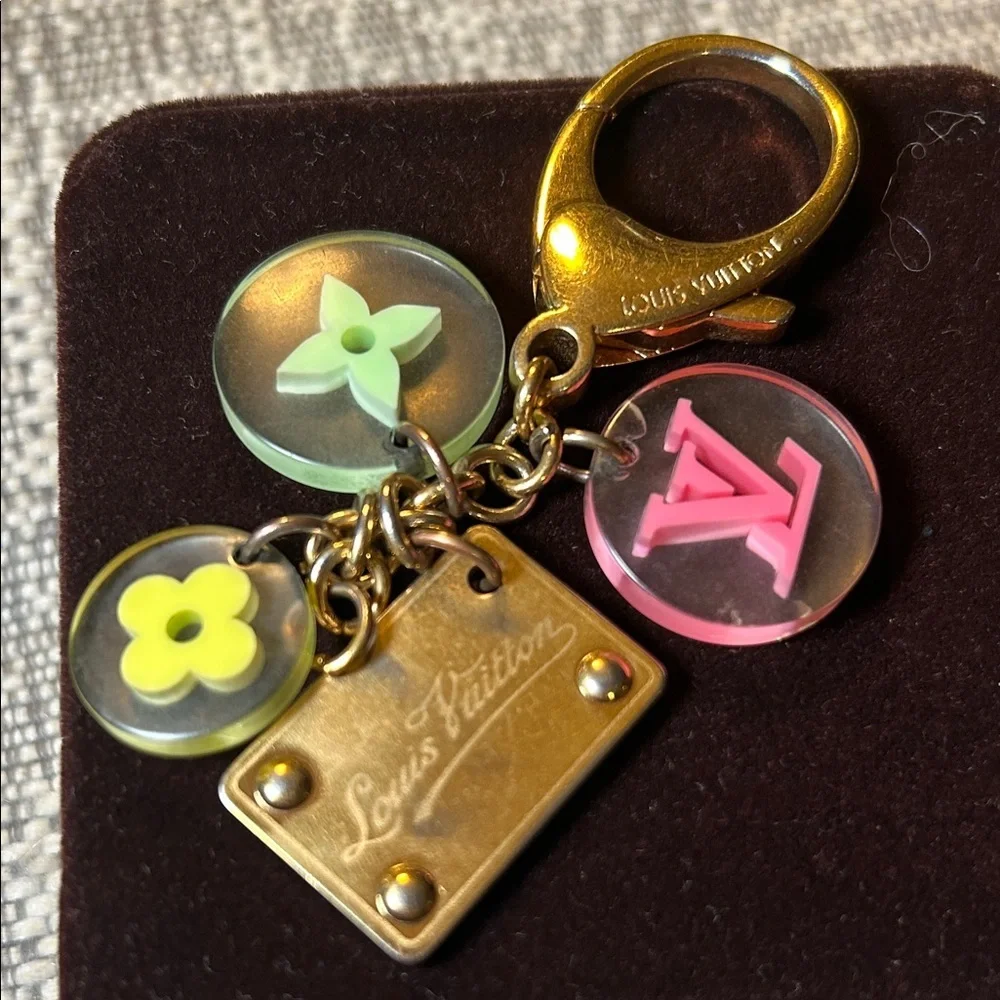 138. Louis Vuitton Gold Keychain with Pink, Yellow, Green Charms with COA